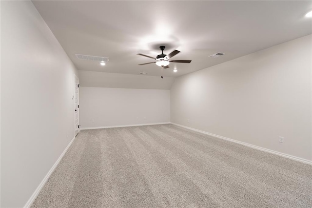 14001 Birch Ln, Edmond, OK 73049 - spare room with light carpet, a ceiling fan, and recessed lighting