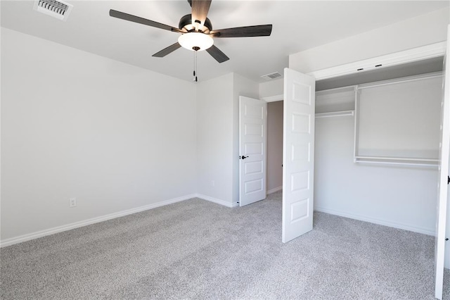 14001 Birch Ln, Edmond, OK 73049 - unfurnished bedroom with carpet floors, ceiling fan, and a closet