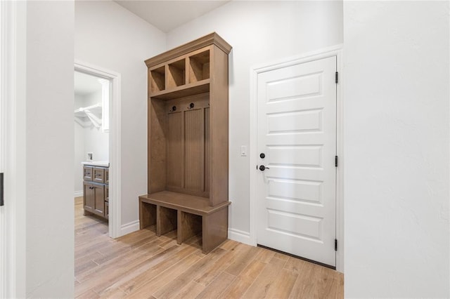 14001 Birch Ln, Edmond, OK 73049 - mudroom featuring light wood-style flooring and baseboards