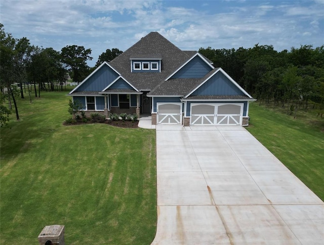 14001 Birch Ln, Edmond, OK 73049 - craftsman house with a front lawn, a garage, a shingled roof, and driveway