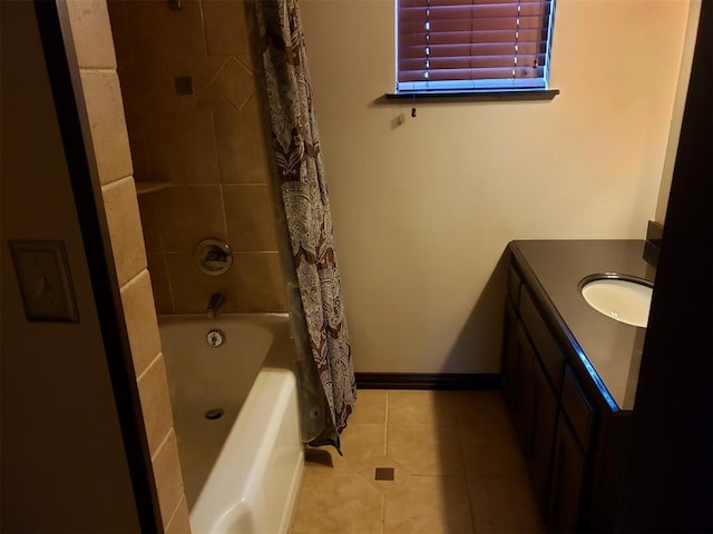 1224 NE 15th St, Oklahoma City, OK 73117 - bathroom featuring shower / bath combo, tile patterned flooring, vanity, and baseboards
