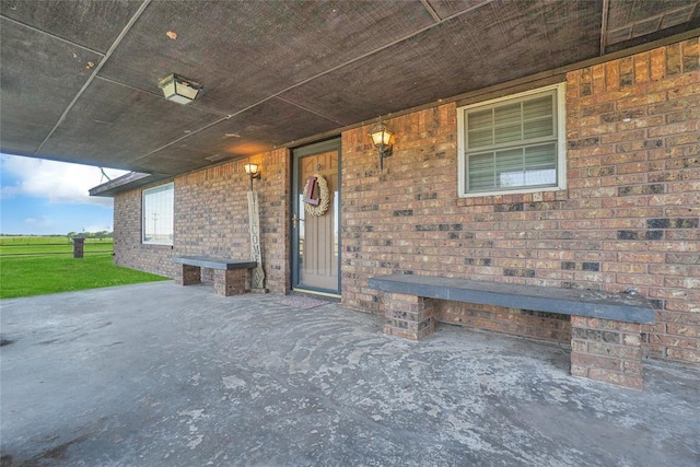 doorway to property featuring a porch