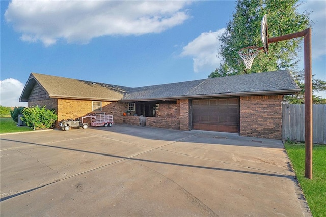 ranch-style home with a garage