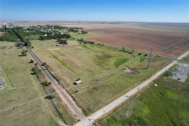 birds eye view of property featuring a rural view