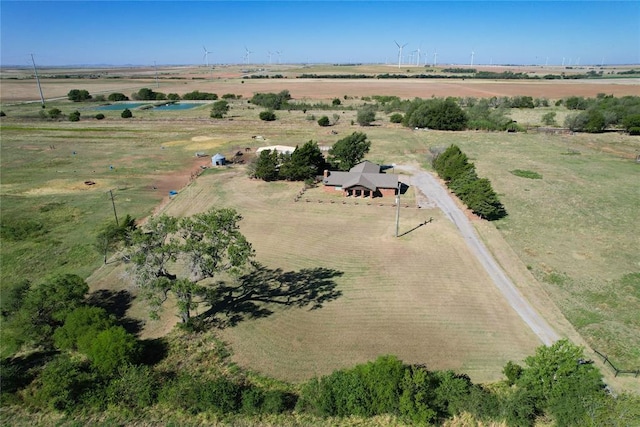 birds eye view of property with a rural view