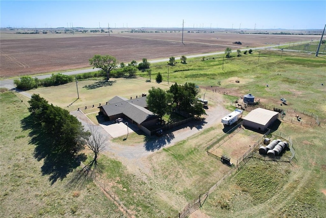 birds eye view of property featuring a rural view