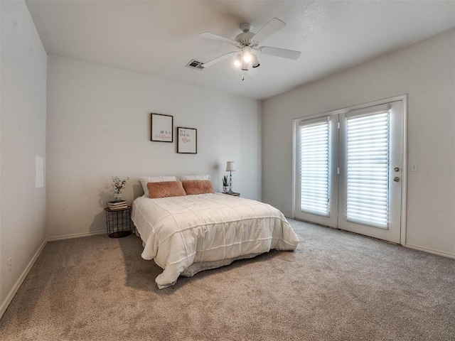 bedroom with access to exterior, ceiling fan, and carpet floors