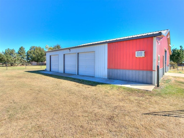 garage with a lawn