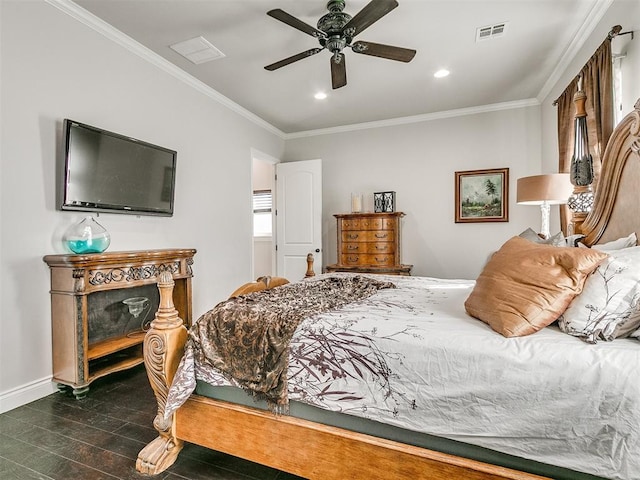 bedroom featuring ceiling fan, dark wood-type flooring, and ornamental molding