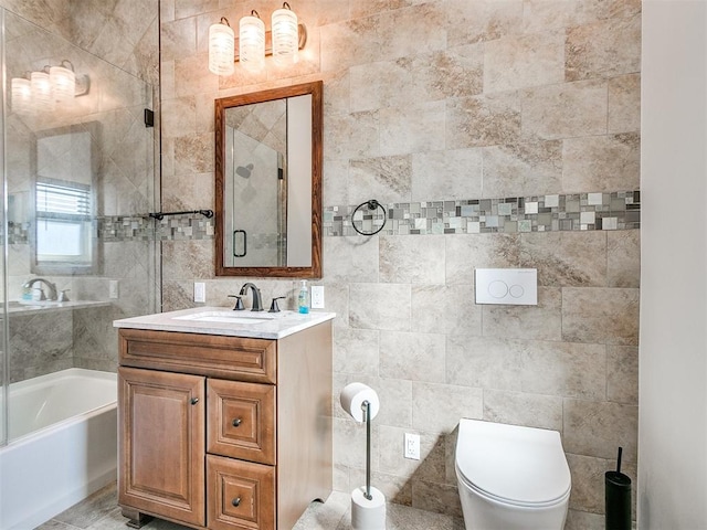 full bathroom with separate shower and tub, vanity, tile walls, and toilet