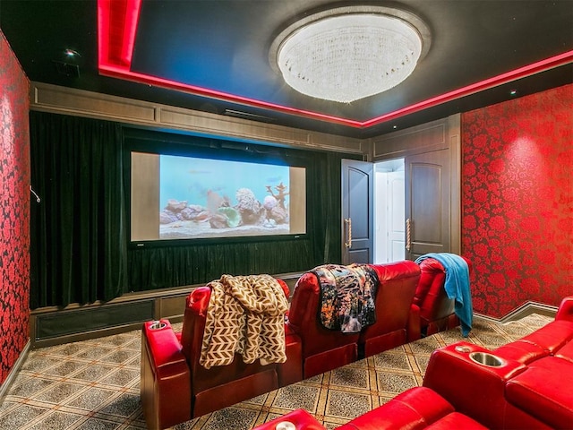 home theater featuring a tray ceiling