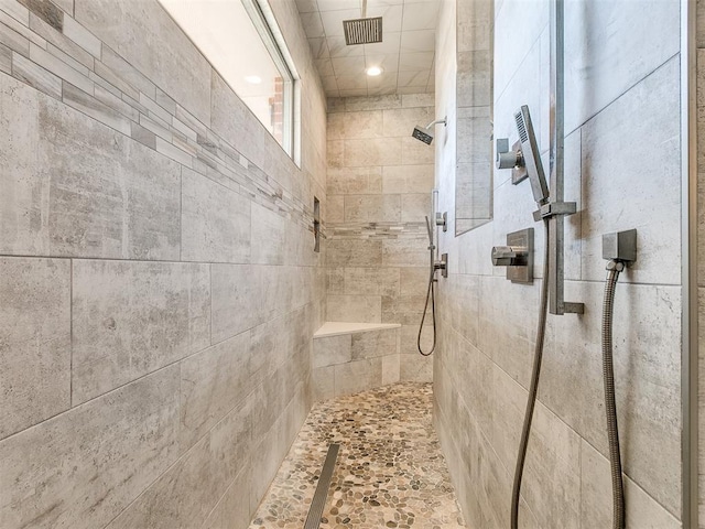 bathroom featuring tiled shower