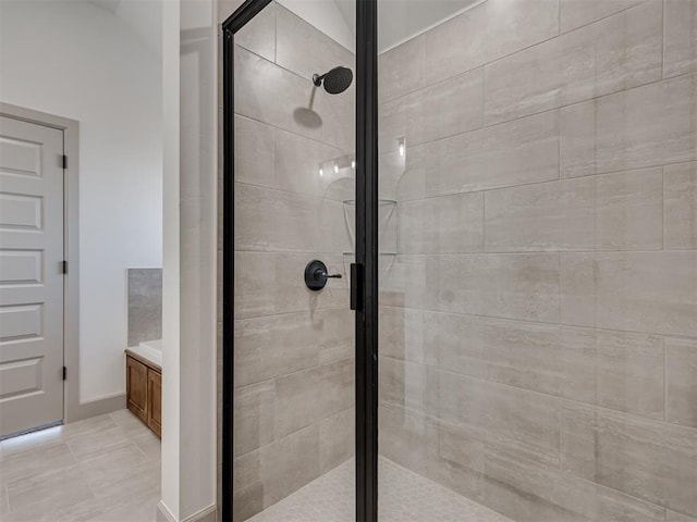 bathroom with a shower stall