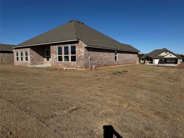 view of home's exterior featuring brick siding