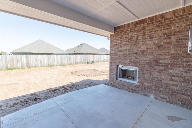 view of patio / terrace with fence