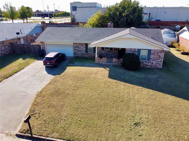 single story home with a front lawn and a garage