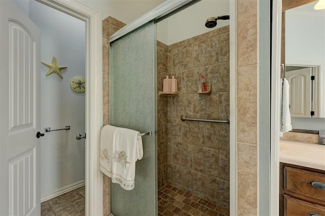 bathroom featuring a shower with shower door