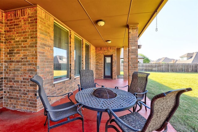 view of patio with an outdoor fire pit