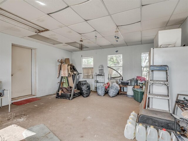 basement featuring a drop ceiling