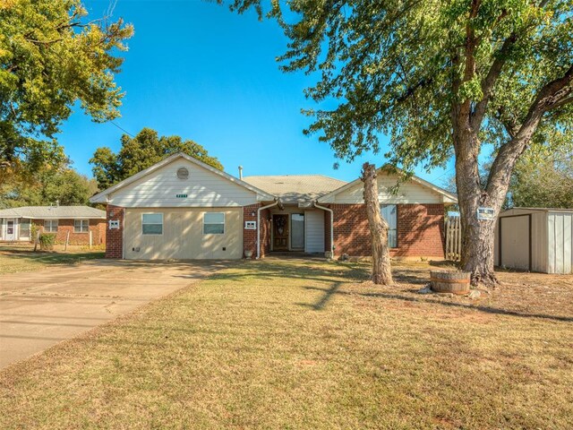 single story home featuring a shed and a front yard