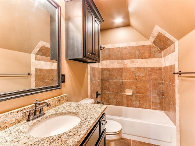 full bathroom featuring vanity, toilet, and tiled shower / bath