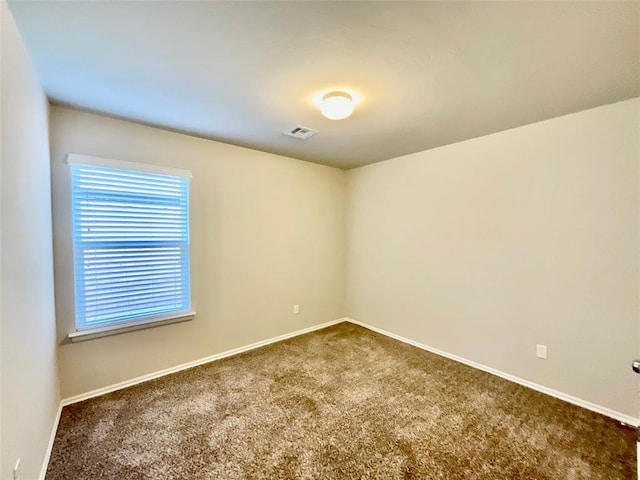 unfurnished room with carpet