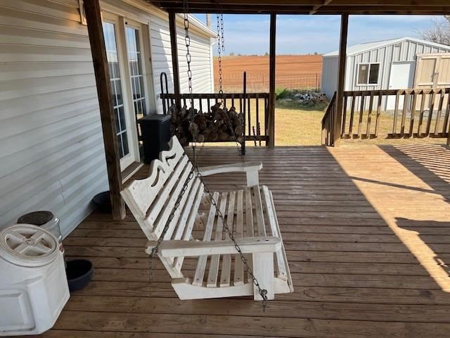 deck with a shed