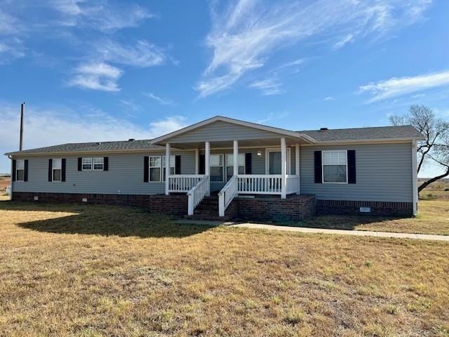 view of front of house with a front yard and a porch