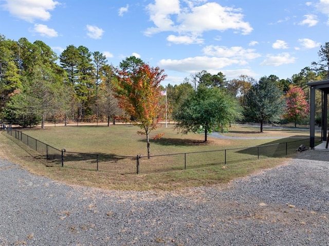 surrounding community featuring a rural view and a lawn