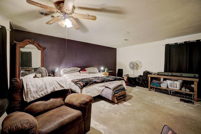 bedroom with ceiling fan and carpet floors