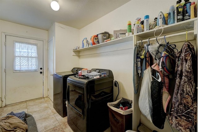 laundry area featuring washing machine and dryer