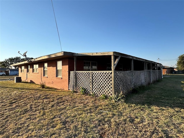 view of property exterior featuring central AC