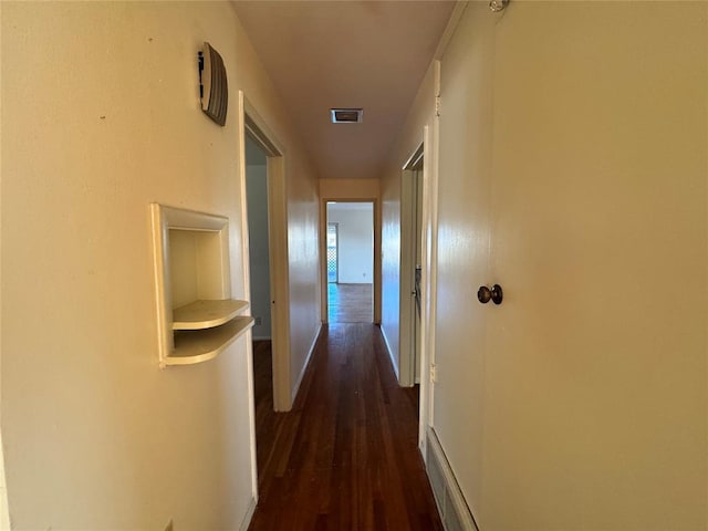 hall featuring dark hardwood / wood-style flooring