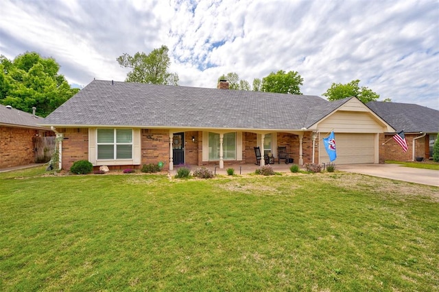 single story home featuring covered porch, a front yard, and a garage