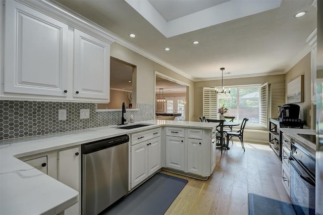 kitchen with dishwasher, light hardwood / wood-style flooring, white cabinetry, and sink