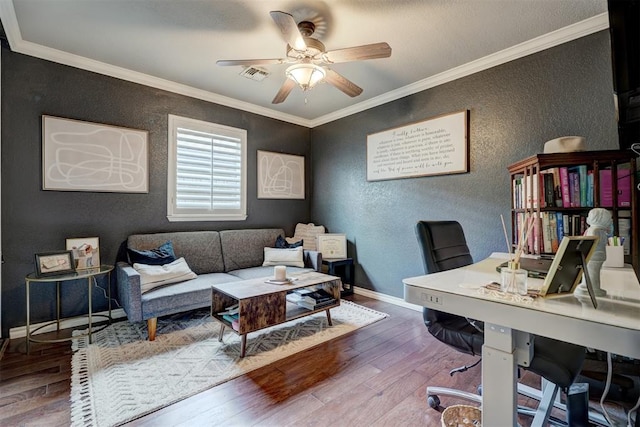 office featuring ceiling fan, crown molding, and hardwood / wood-style flooring