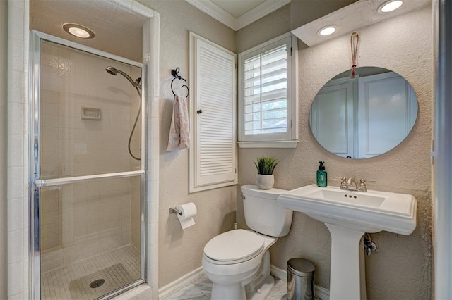 bathroom featuring crown molding, an enclosed shower, and toilet