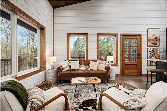 sunroom / solarium with a wealth of natural light and lofted ceiling