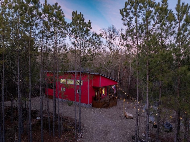 view of outdoor structure at dusk