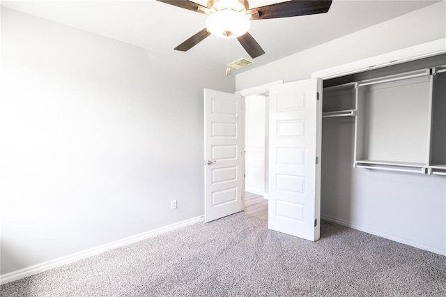 16025 Coneflower Dr, Edmond, OK 73013 - unfurnished bedroom with carpet, baseboards, a closet, and ceiling fan