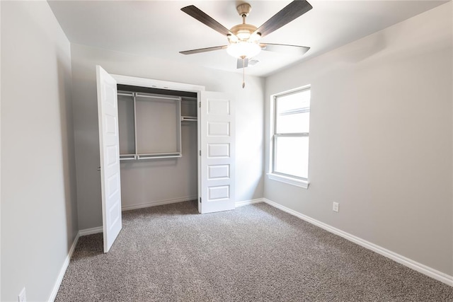 16025 Coneflower Dr, Edmond, OK 73013 - unfurnished bedroom with carpet, a closet, baseboards, and ceiling fan