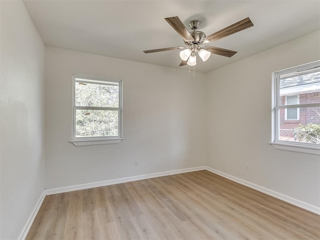 unfurnished room with light hardwood / wood-style floors and ceiling fan