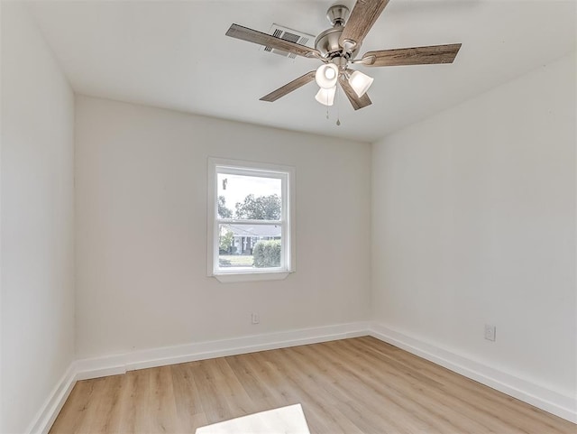 spare room with ceiling fan and light hardwood / wood-style flooring