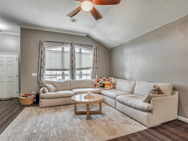 living room with crown molding, dark wood-type flooring, lofted ceiling, and ceiling fan