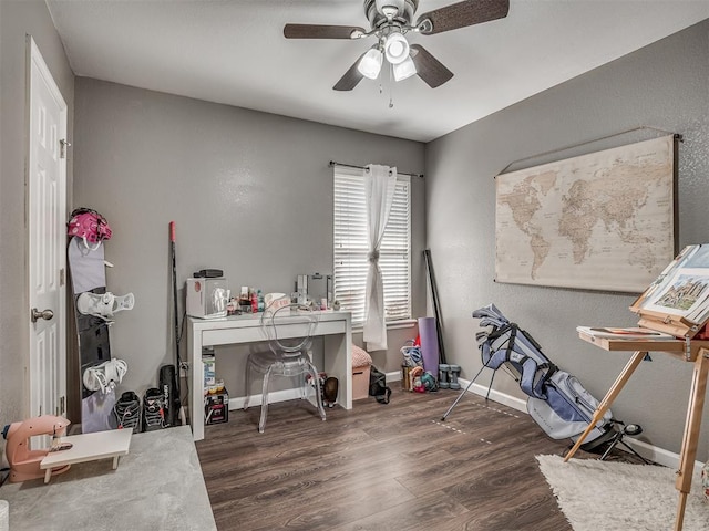 office space with dark wood-type flooring and ceiling fan