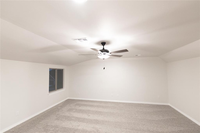 9201 Lupine Rd, Yukon, OK 73099 - bonus room featuring vaulted ceiling, ceiling fan, light colored carpet, and baseboards