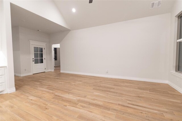 9201 Lupine Rd, Yukon, OK 73099 - unfurnished room featuring light wood-type flooring, lofted ceiling, baseboards, and recessed lighting