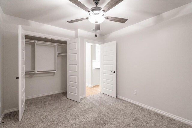 9201 Lupine Rd, Yukon, OK 73099 - unfurnished bedroom with carpet floors, a closet, baseboards, and ceiling fan