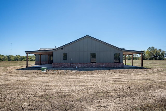 view of home's exterior with a carport