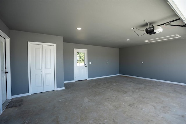 garage featuring a garage door opener